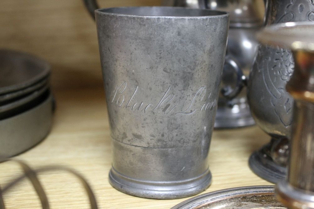 A Victorian silver plated chamberstick, pewter tankards, plates and a toast rack